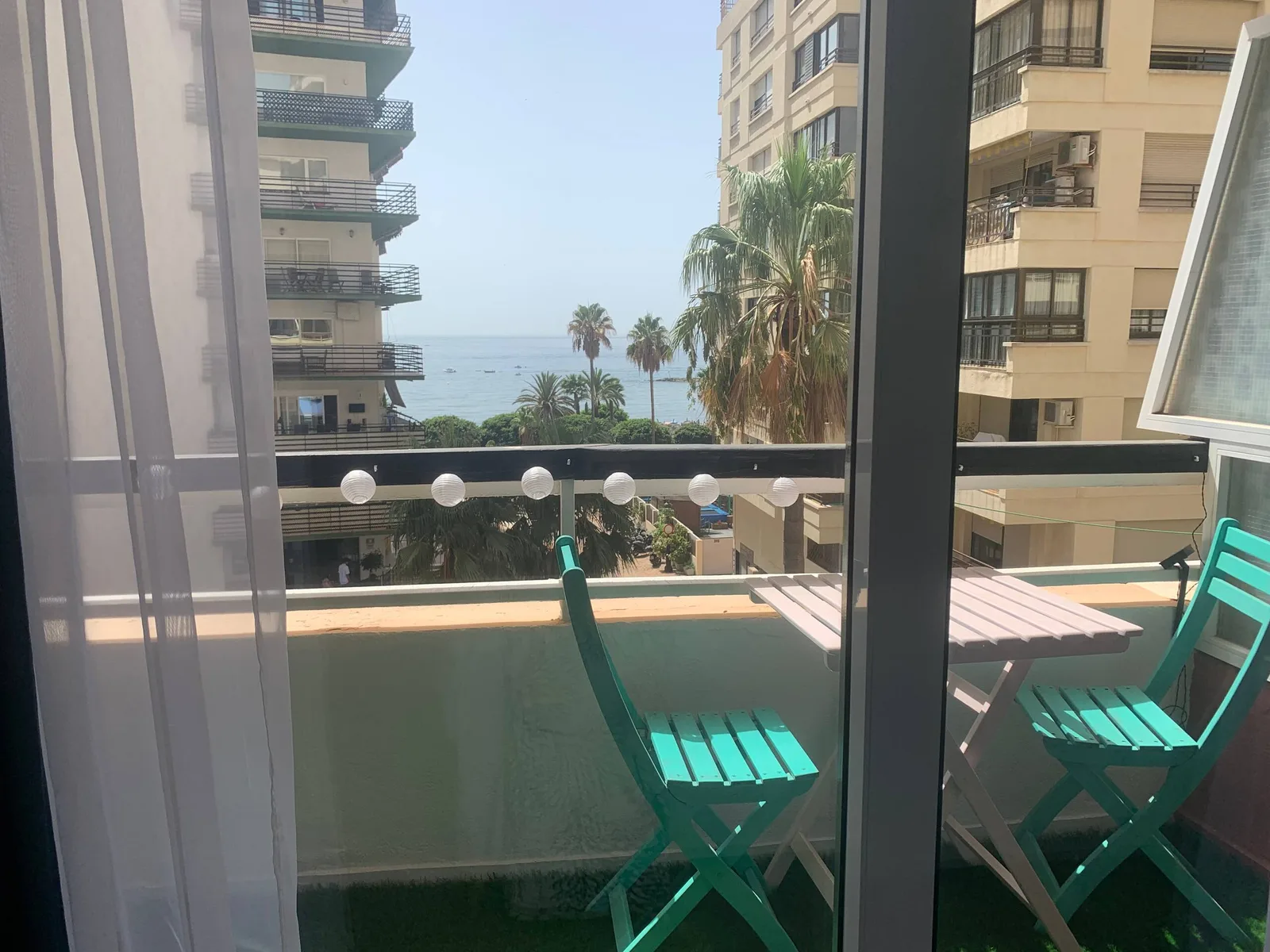Marbella · Balkon & zeezicht — before HostRev